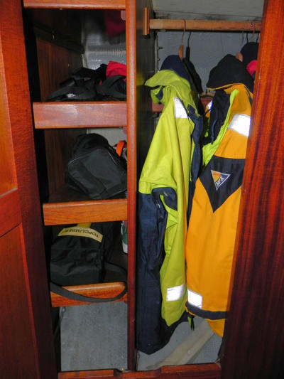 Opposite the toilet compartment is the wardrobe with hanging space for Oilies etc and shelves for other items. A heater outlet is situated in the bottom of the hanging space to help in drying any wet gear. The doors on both the toilet compartment and ward